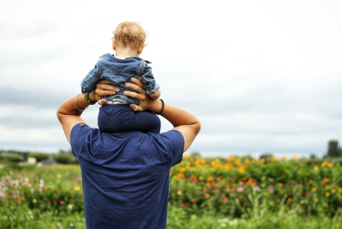 Dad holding child